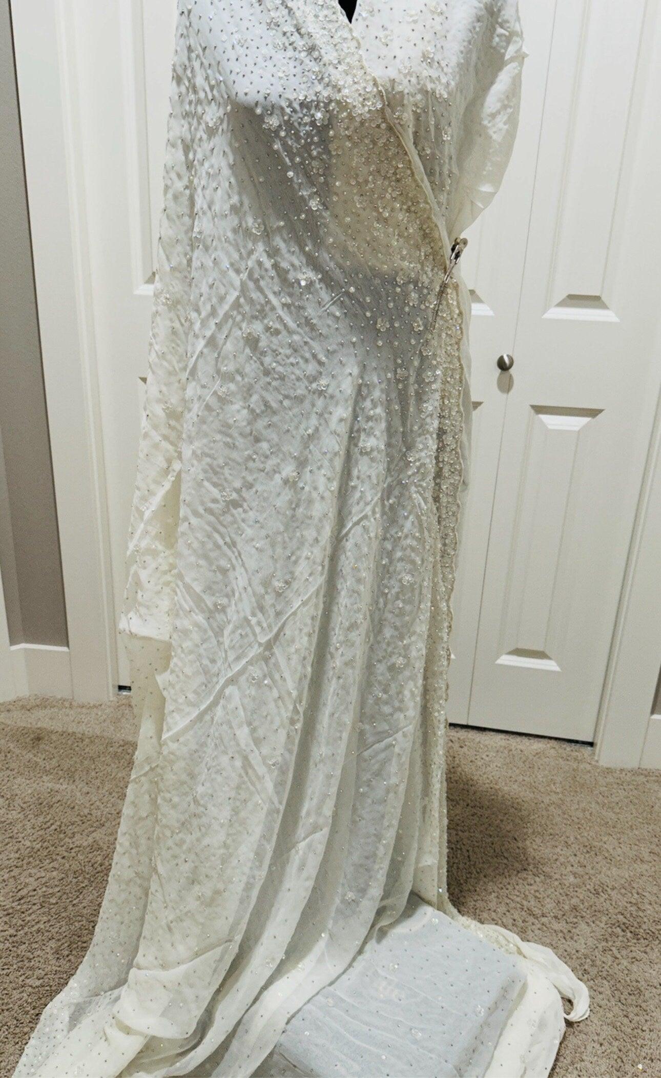 Pure Georgette Hand work Saree in Beige/Cream