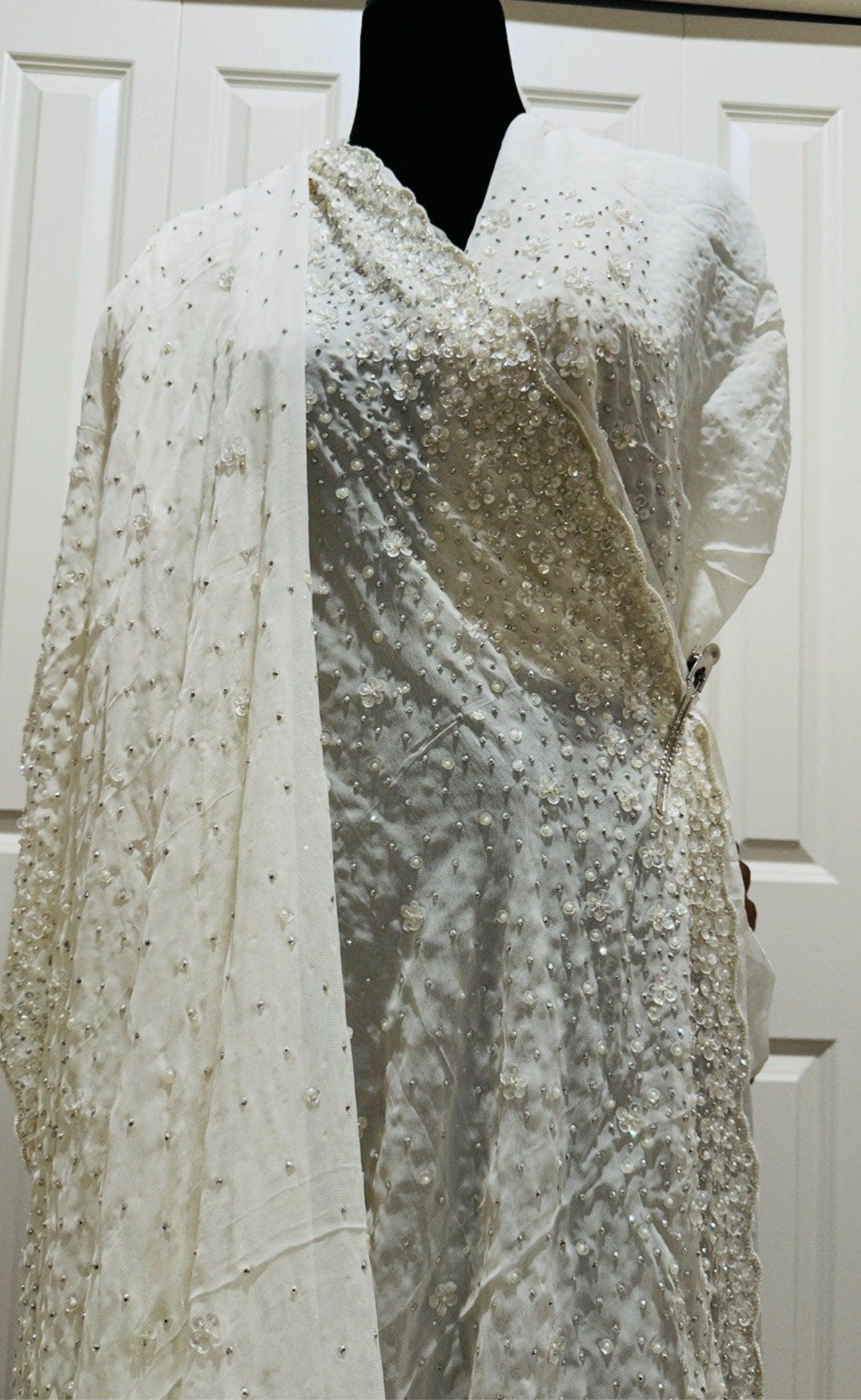 Pure Georgette Hand work Saree in Beige/Cream